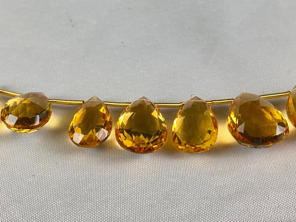 String of Citrine Jewel Beads: String of Citrine Jewel Beads DETAILS: Metal - none Color - orange Size - 4.5"