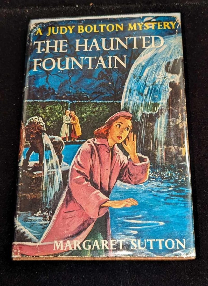 1st Ed Judy Bolton The Haunted Fountain Hardcover #28: 1st Ed Judy Bolton The Haunted Fountain Hardcover #28. "A Judy Bolton Mystery - The Haunted Fountain ". By Margaret Sutton (The pen name of Rachel Beebe) was published by Grosset & Dunlap (New York) a