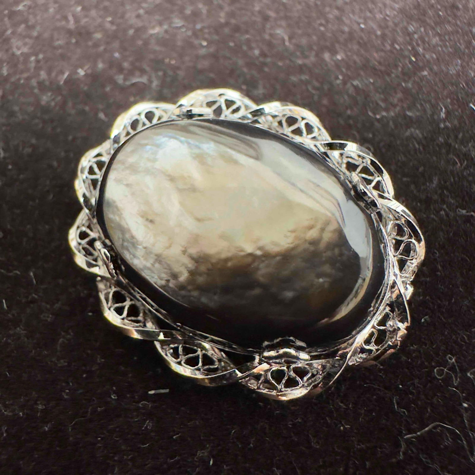 Black Pearloid Filigree Sterling Silver Brooch C42: This item is in good pre-owned, previously used/displayed condition with noticeable light wear, and surface scratches. Please reference all photos for full details. This piece of jewelry has been test