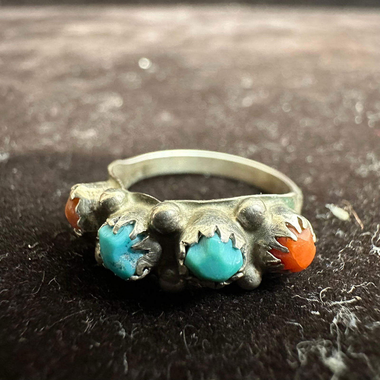 Four Stone Red Coral Turquoise Silver Ring Native Style: This item is in good pre-owned, previously used/displayed condition with noticeable light wear and surface scratches. Please reference all photos for full details. This piece of jewelry has been