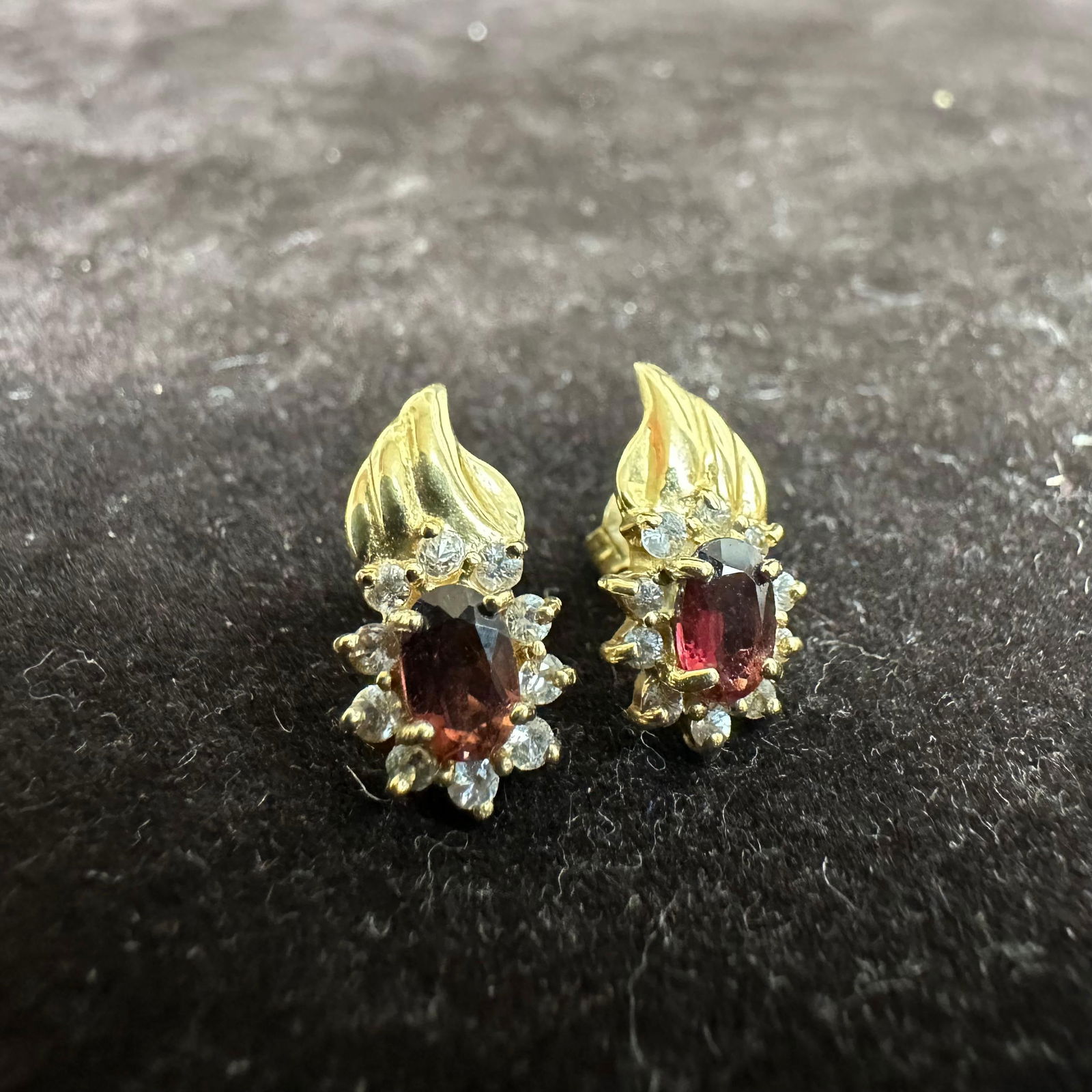 14K Yellow Gold Garnet and Accent Diamonds Fine Earrings: This item is in good pre-owned, previously used/displayed condition with noticeable light wear and surface scratches. Please reference all photos for full details. This piece of jewelry has been
