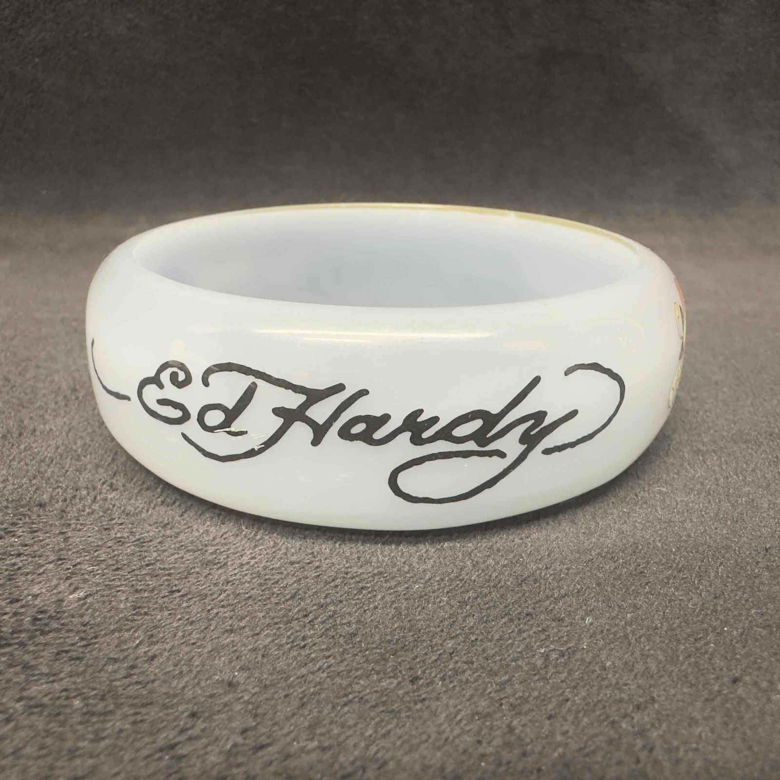 Ed Hardy Christian Audigier Slip on Bangle Original Officially Licensed Bracelet Gray: Ed Hardy Christian Audigier Slip on Bangle Original Officially Licensed Bracelet Gray. Light scratches throughout the bracelet. This item is in good pre-owned, previously displayed condition with