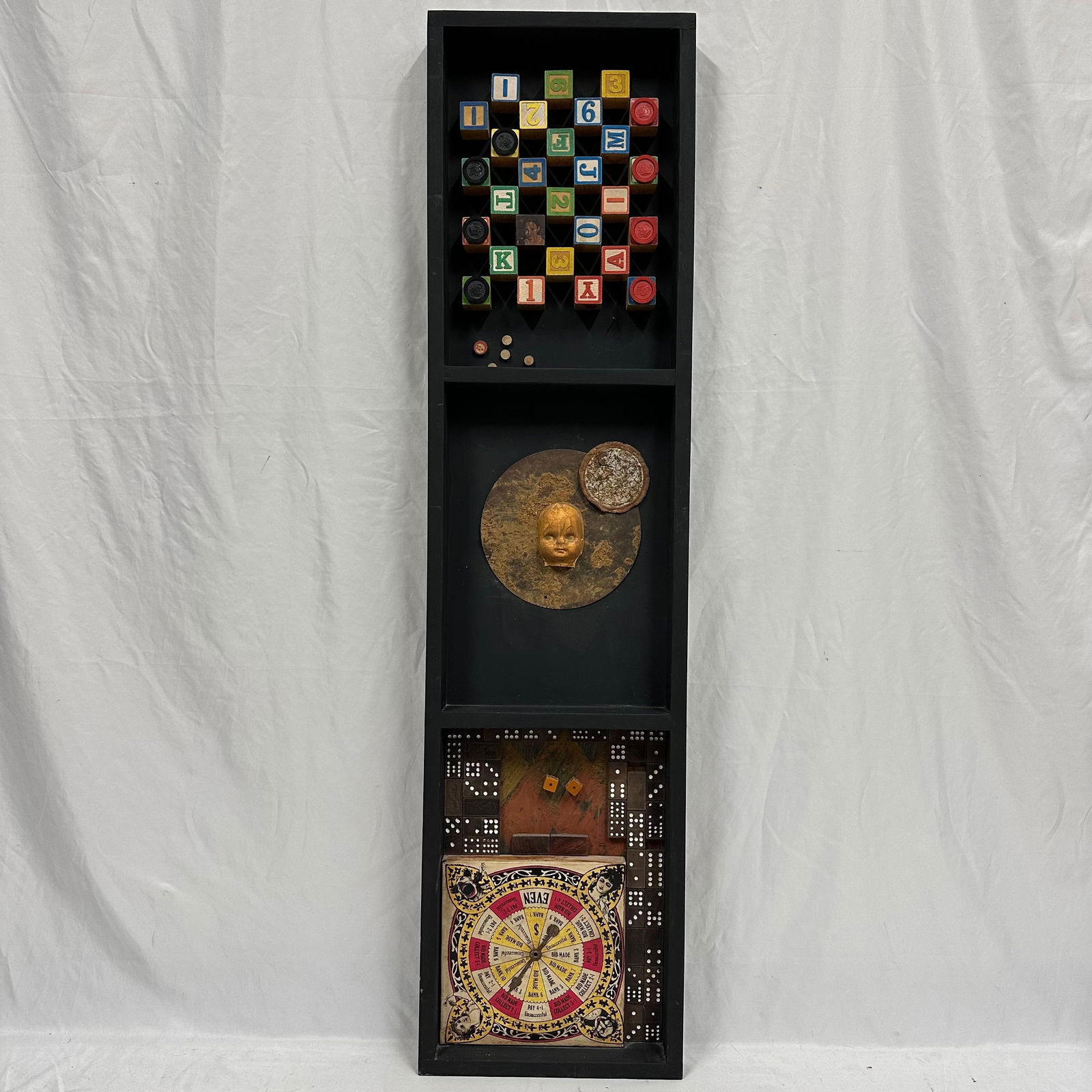 Tall Mixed Media Shadow Box Wall Art Featuring Board Game Pieces and Elements Doll Face (1 of 14)