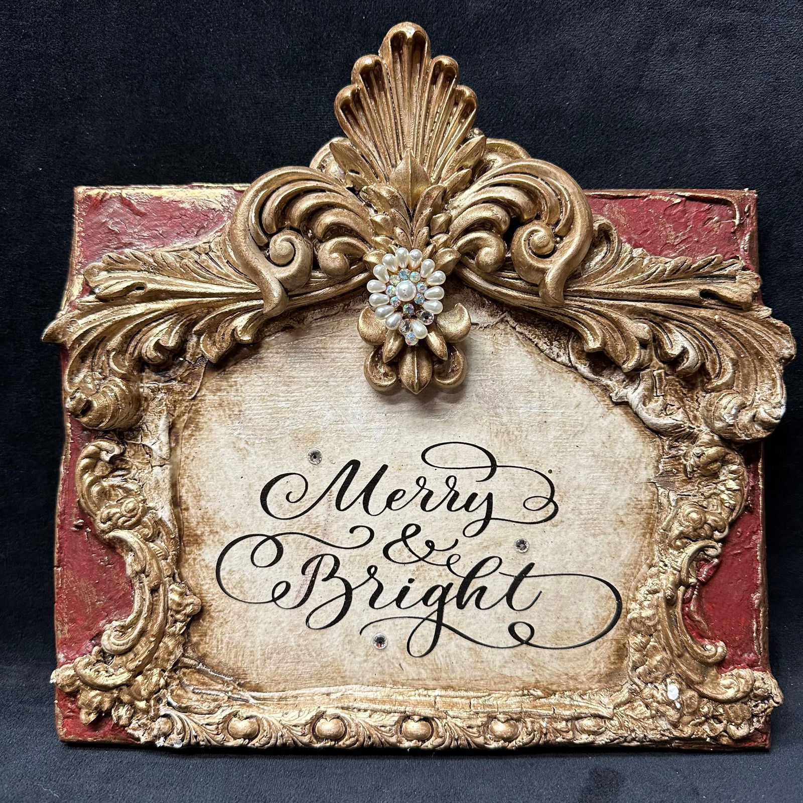 Michelle Butler Designs Merry and Bright Plaque Small Sign Decor: Merry and Bright handcrafted decor piece. Minor chips on resin wood decor. Unique plaque handcrafted art piece featuring rhinestone accents. Signed by artist Michelle Butler on the back. Minor loose p