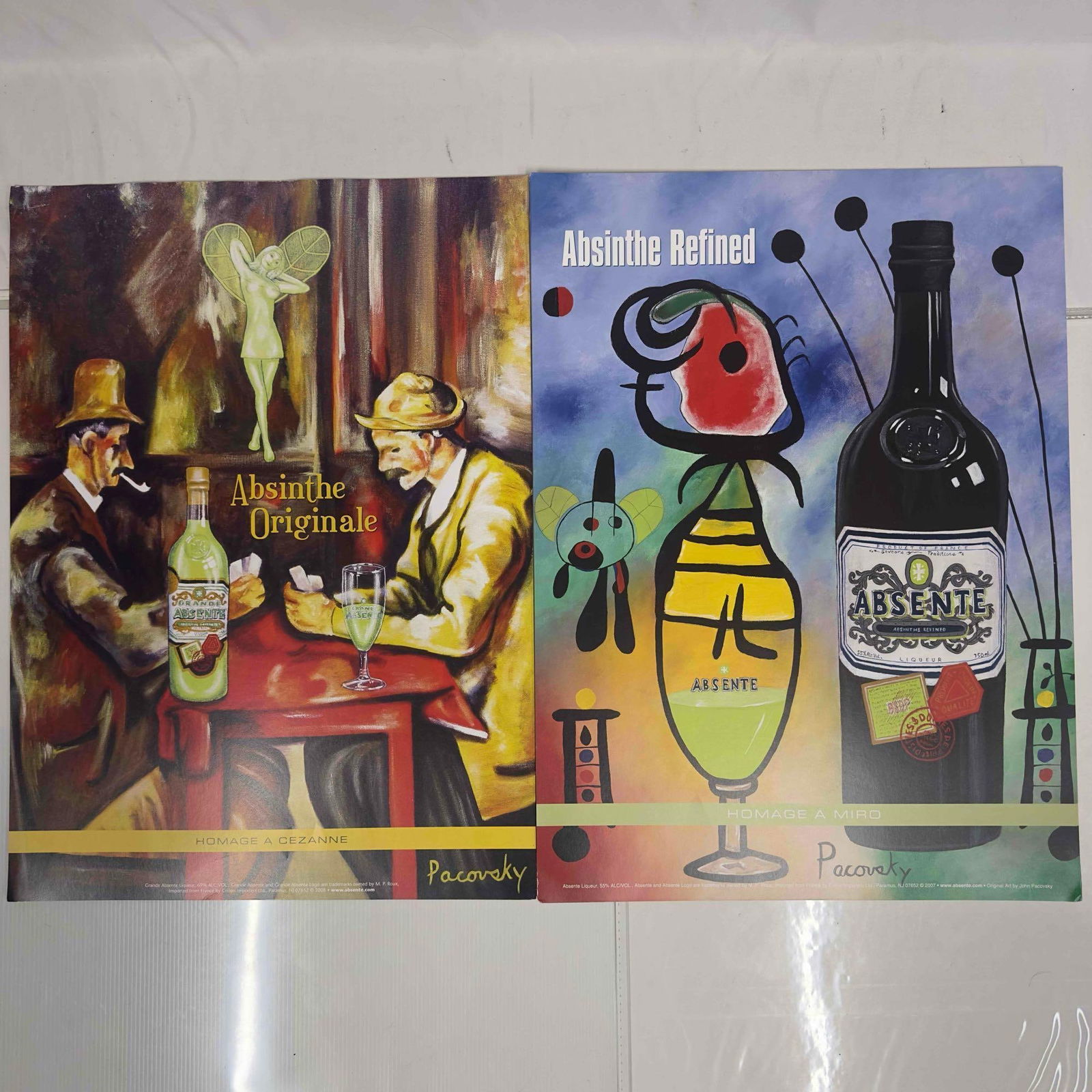 Absinthe Refined Ad Poster Homage by John Pacovsky Liquor Advertisement Set Lot of Eleven 11 Posters: Absinthe Refined Ad Poster Homage by John Pacovsky Liquor Advertisement Set Lot of 4. This set includes six (6) posters Homage A Cezanne and five (5) Homage A Miro by John Pacovsky. A few noticeable c