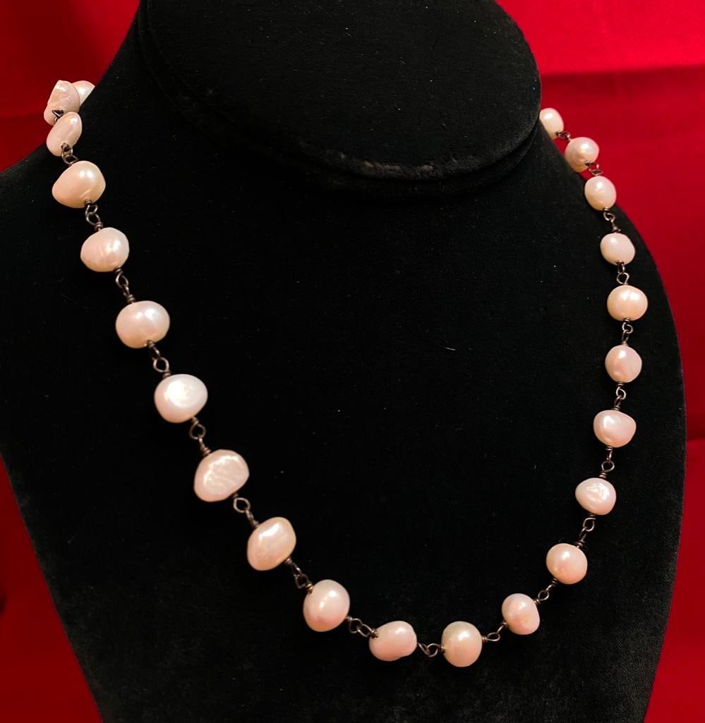 Sterling River Pearl Necklace: This piece of jewelry as been tested and researched prior to testing . Please view all our pictures they are part of our description. DETAILS: Metal - Sterling SilverColor - SilverStones - River