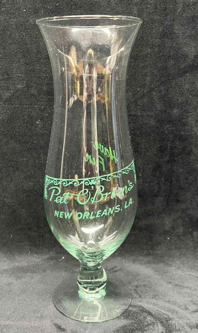 Pat O'Brien's New Orleans, LA. Hurricane Glass: This lot contains a Pat O'Brien's New Orleans, LA. Hurricane Glass. It is approx 3 1/4" x 3 1/4" x 10". Total weight is 0.6lbs. Overall the Hurricane Glass is in excellent used condition with no