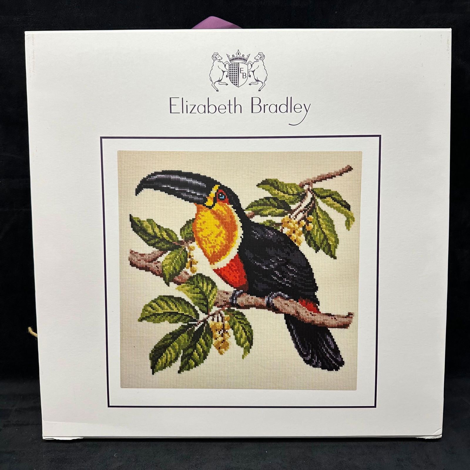 Elizabeth Bradley Needlework Tropical Collection Toucan Tapestry Kit: Elizabeth Bradley English needlework tapestry kit titled Tropical Collection Toucan. Kit appears used and partially done, and includes printed canvas, tapestry wool, a color chart card, needles, and f