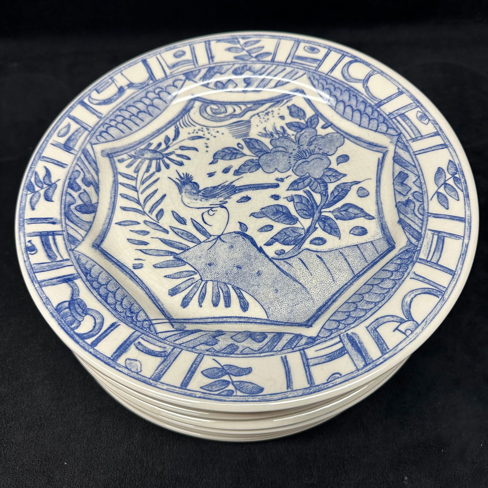 Gien France Oiseau Bleu Blue and White Porcelain Dinner Plates Set of Ten: Matching set of ten porcelain plates by Gien, France. Plates feature a blue and white design with floral and bird motifs in the center, surrounded by a geometric border. All plates are marked on the
