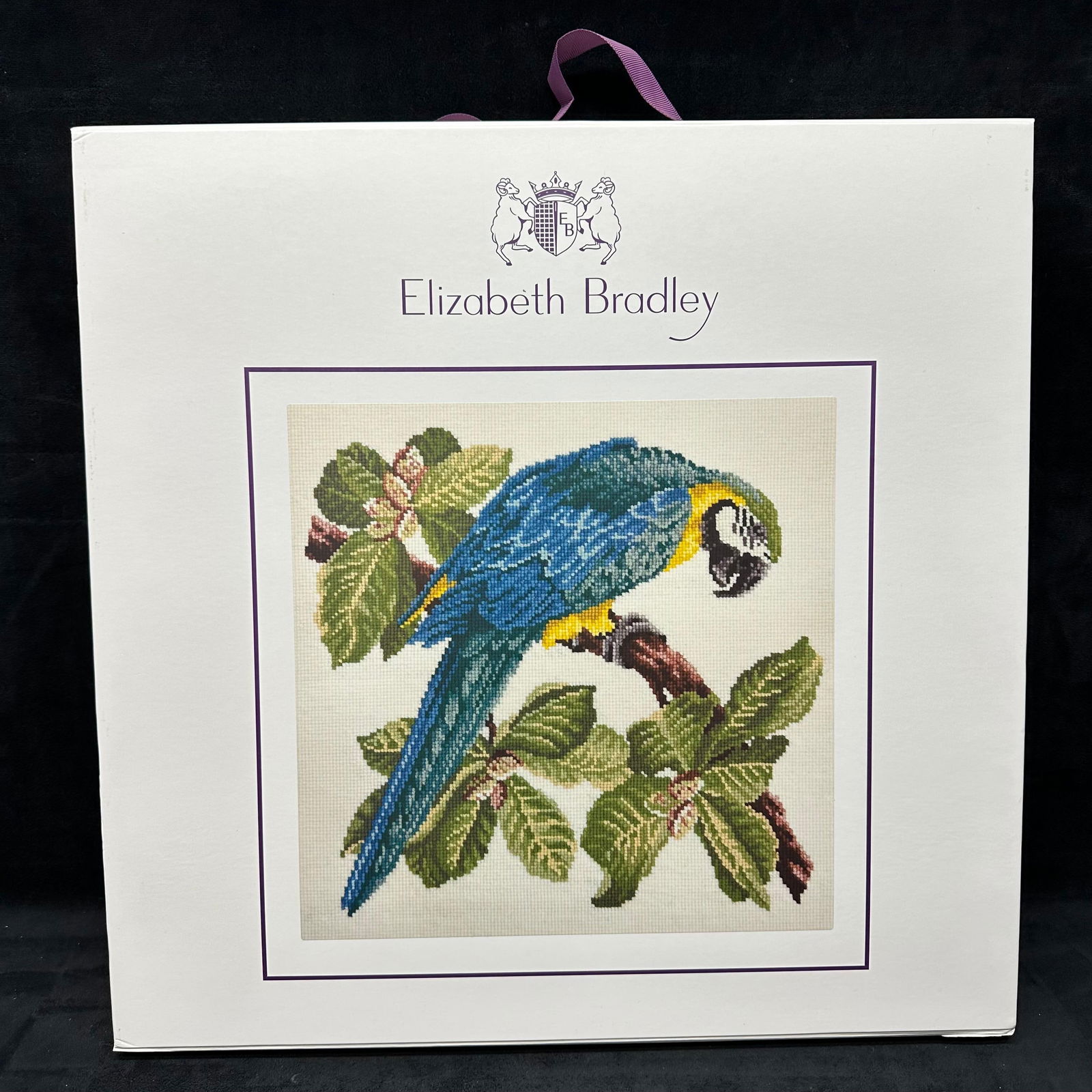 Elizabeth Bradley Needlework Tropical Collection Macaw Tapestry Kit: Elizabeth Bradley English needlework tapestry kit titled Tropical Collection Macaw. Kit appears used and partially done, and includes printed canvas, tapestry wool, a color chart card, needles, and fu