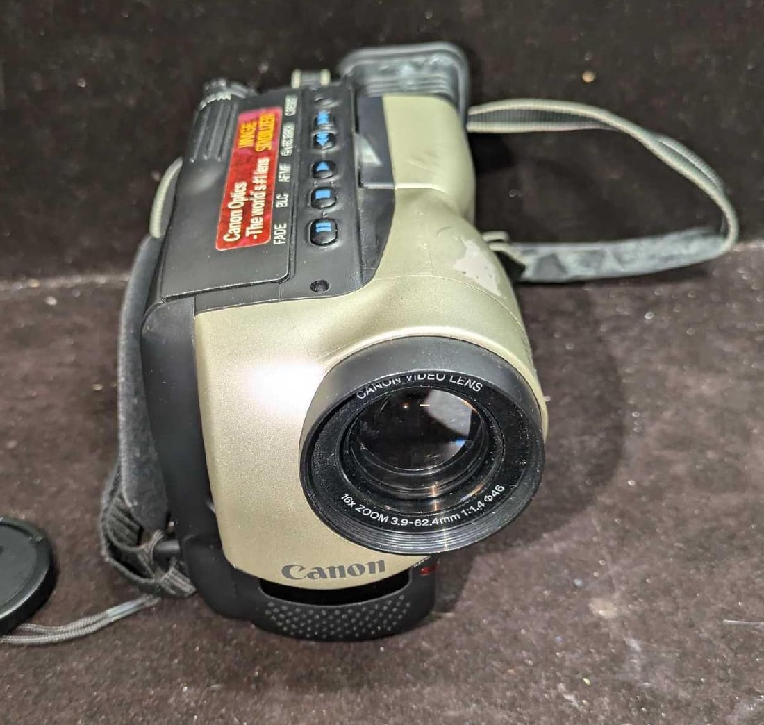 Canon ES280 8mm Video Camcorder With Accessories: Canon ES280 8mm Video Camcorder With Accessories. Was tested and it works (plugged in). The battery may need replacing. The camera has some wear and color loss. It comes in a Ambico carrying case that