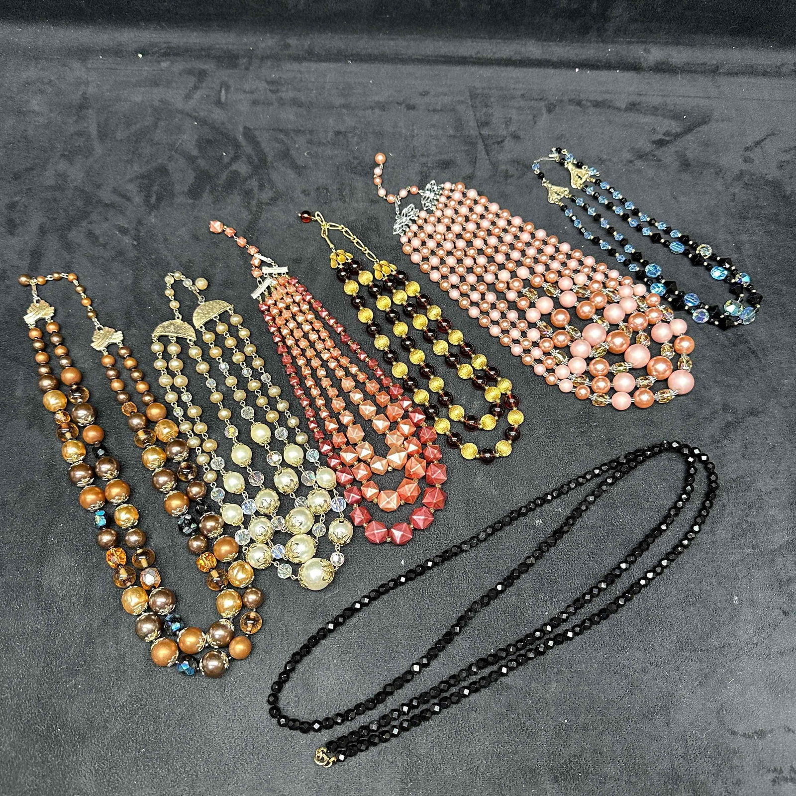 Costume Jewelry Necklaces Set Various Faux Pearl Plastic Glass Beaded Style F13: Costume Jewelry Necklace Set Various Necklaces Faux Pearl Plastic Beaded Accents. Seven necklaces included in this set, with some made of plastic, glass, and other material beads and faux pearl accent