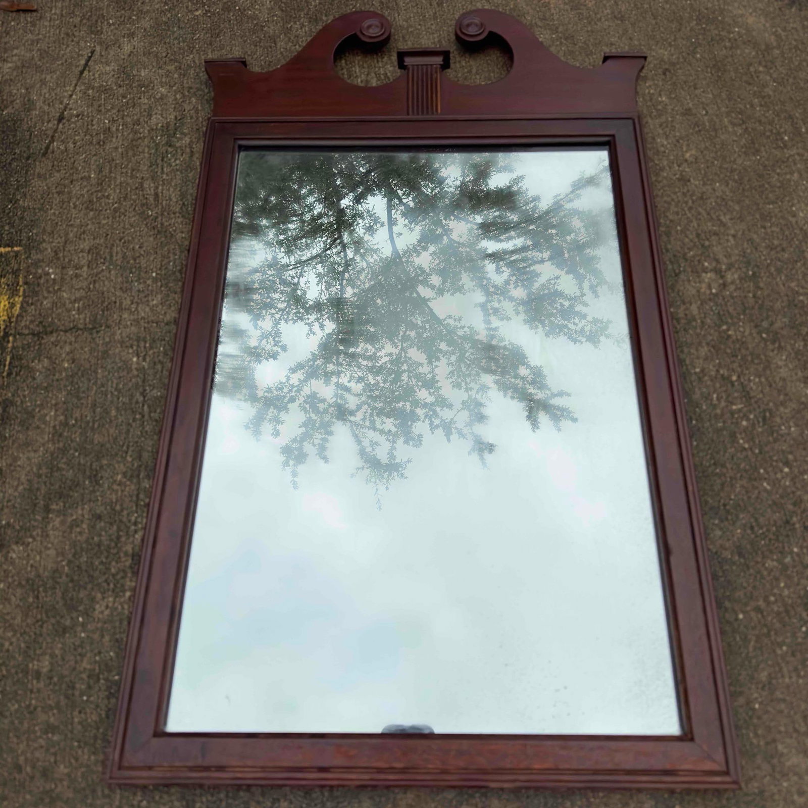 American Federal Brown Wood Chippendale Wooden Mirror: American Federal Brown Wood Chippendale Wooden Mirror. This piece shows no noticeable signs of chips, breaks, or cracks in the glass. This mirror shows signs of wear with a small chip in the wood on t