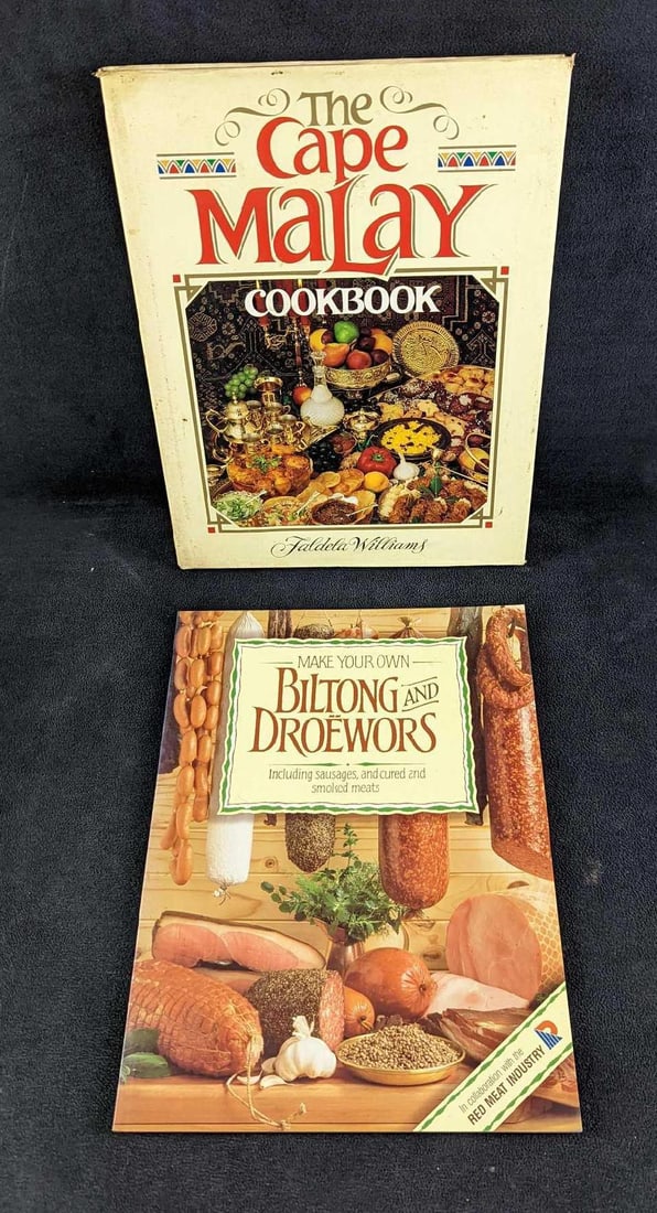Cape Malay Cookbook & Make Your Own Biltong & Droewors: This lot consists of: (1) The Cape Malay Cookbook By Faldela Williams Hardcover. This was published by Stiruik Publishers (Capetown) in 1992. The book is approx 8 3/4" x 3/8" x 11 1/2". S