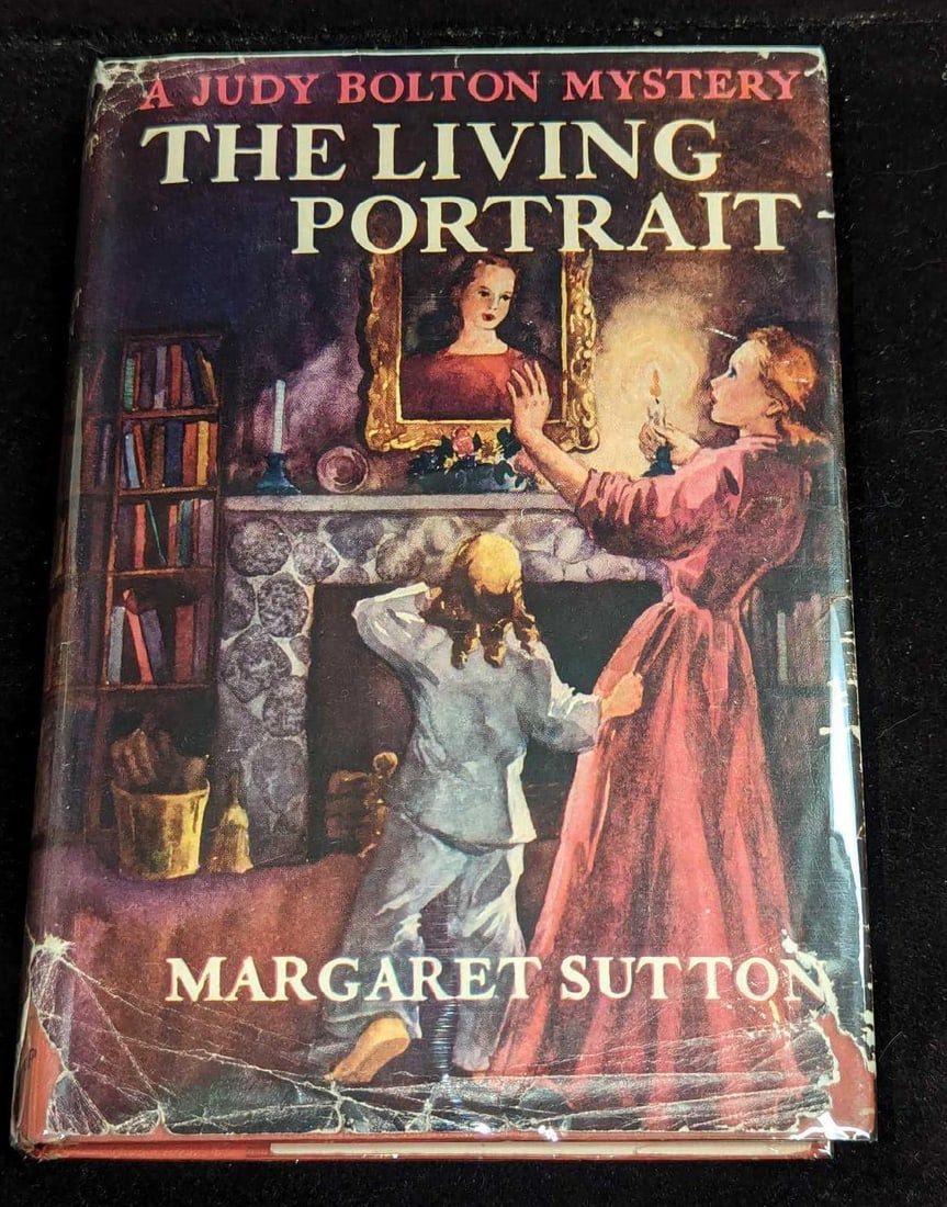 1st Ed Judy Bolton The Living Portrait HC #18: 1st Ed Judy Bolton The Living Portrait HC #18. "A Judy Bolton Mystery - The Living Portrait". By Margaret Sutton (The pen name of Rachel Beebe) and was published by Grosset & Dunlap (New York) and was