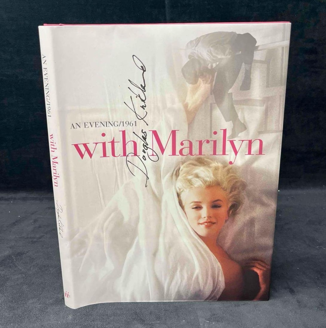 Signed Hardcover Copy An Evening With Marilyn 1961By Douglas Kirkland: This lot contains a Hardcover Copy An Evening With Marilyn 1961By Douglas Kirkland. It is approx 14" x 10" x 3/4". Total weight is 3lbs. Overall the Book is in excellent pre owned condition with no
