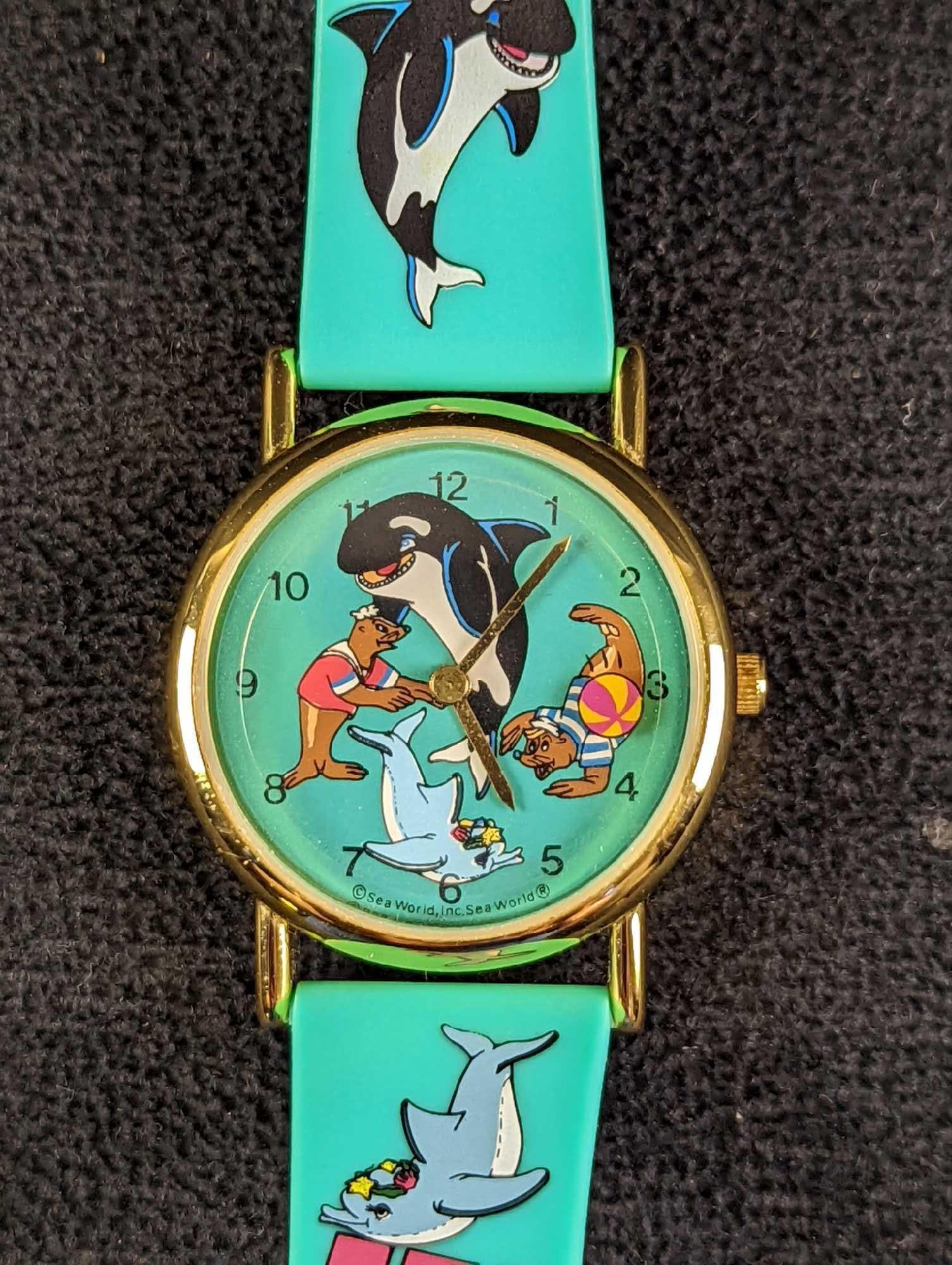Sea World Valdawn Watch: Sea World Valdawn Watch With Rubber Watch Band. Water Resistant. Comes in its original box which is approx 2" x 2 3/4" x 3 1/2" and it weighs 0.21lb. The watch is in good, unused condition and it requ