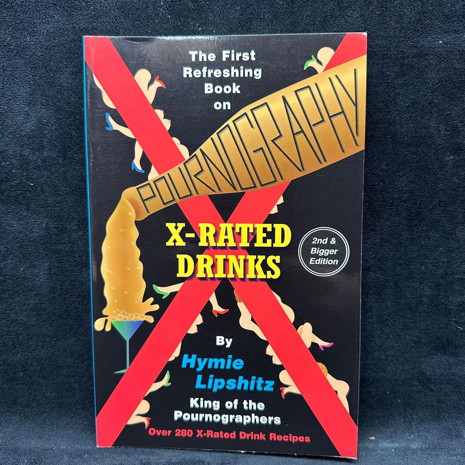 X-Rated Drinks PournoGraphy 2nd and Bigger Edition by Hymie Lipshitz Signed: Signed with a personal inscription to Michel Roux. Condition shows general handling wear, scuffing, and surface marks to the cover consistent with age. Interior pages appear intact. Includes dust jack