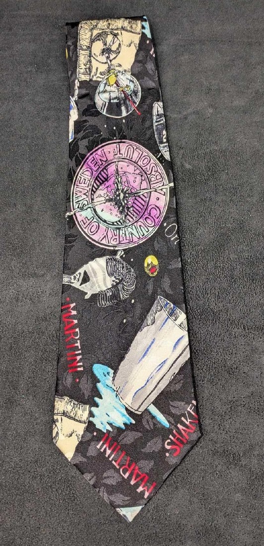 Absolut Vodka Nicole Miller Silk Tie Martini New: Absolut Vodka Nicole Miller Silk Tie Martini New. 100% silk tie designed by artist Nicole Miller, for Absolut Vodka in the 1990s. It does not appear to have been used. In the package, it is