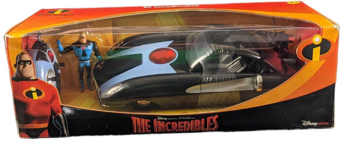 Rare Incredibles Remote Control Car Incredimobile: Rare Incredibles Remote Control Car "Incredimobile" still sealed in its original box. This was originally sold at the Disney Store. Requires 1 Volt Battery And 6 AA batteries. These are included. "Pla