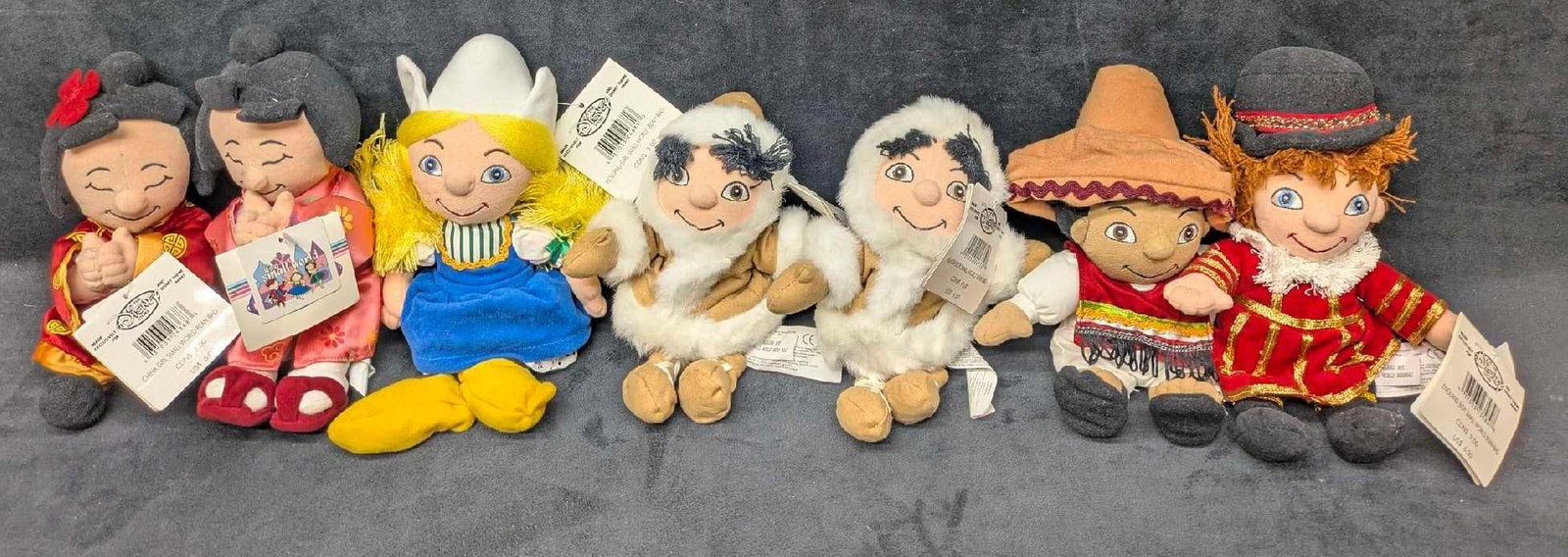 Disney's Its A Small World Bean Bag Set Of 7: Disney's Its A Small World Bean Bag Set Of 7. Please note, this comes with two Eskimo boys bean bags. The set comes in a bag that is approx 14" x 13" x 4" and it weighs 1.90lb. The bean bag dolls have