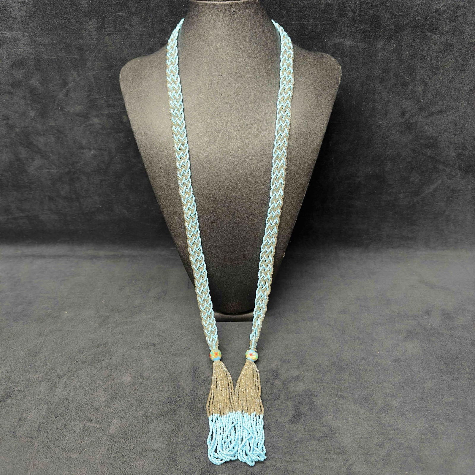 Murano Venetian Lamp Work Art Glass Light Blue Beaded Silver Accents Long Lariat Necklace G15: Murano Venetian Lamp Work Art Glass Light Blue Beaded Silver Accents Long Lariat Necklace G15. Necklace with light blue colored glass beads with beautiful designs on each. The necklace features