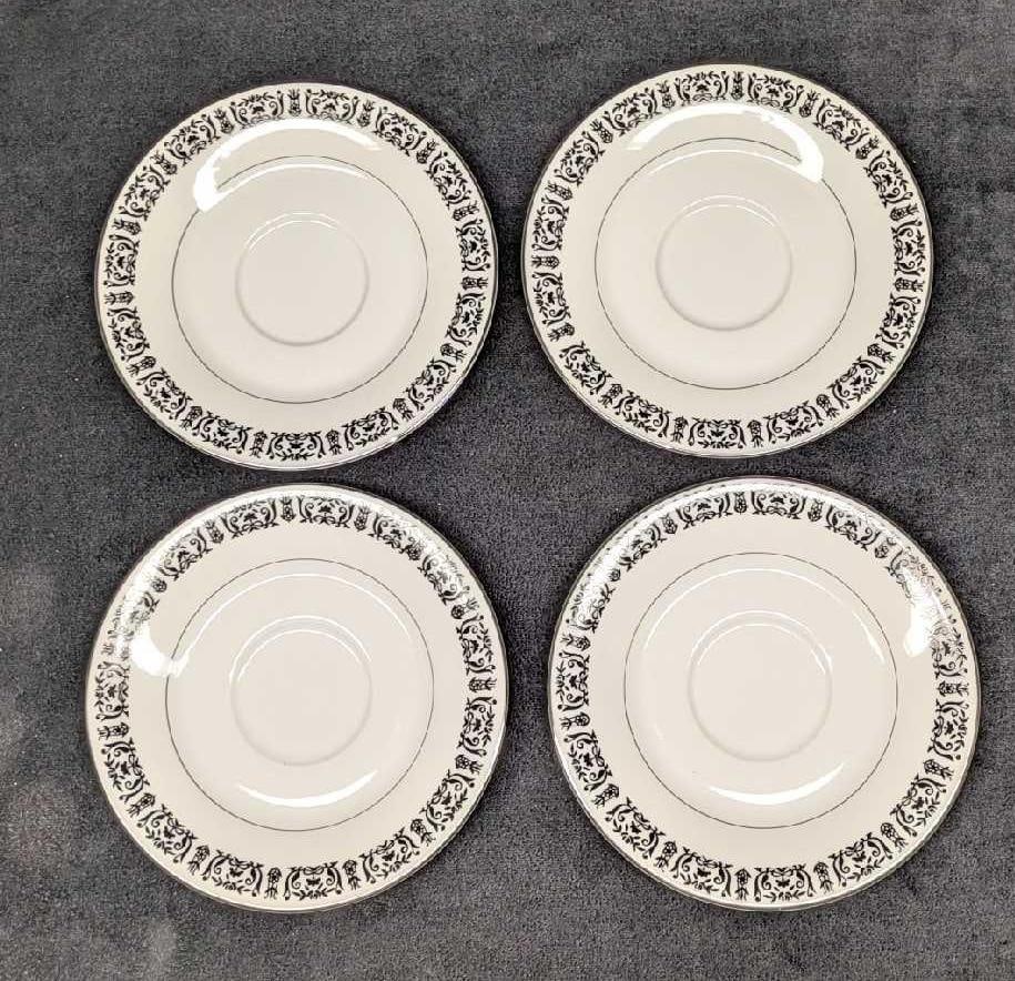 4 Retired Treasure Chest Majestic Saucers: 4 Retired Treasure Chest Majestic Saucers. Each of the fine china plates is approx 6" x 6" x 3/4" and the total weight is 1.46lb. The saucers have no chips or cracks.