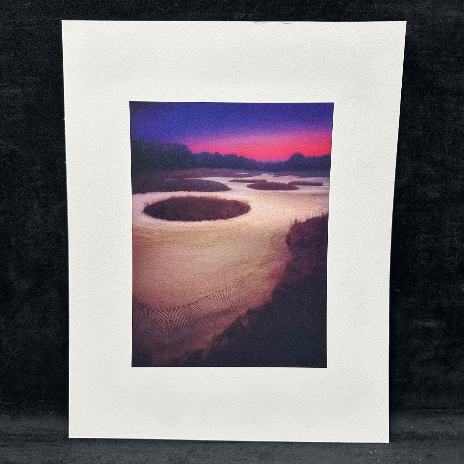 Golf Course Bunker at Sunset High Quality Art Print Lithograph GC5: Striking lithograph art print capturing a dramatic golf course bunker landscape under a vivid purple and red sunset sky. Printed on textured, heavyweight paper for a gallery-quality look and feel. Thi