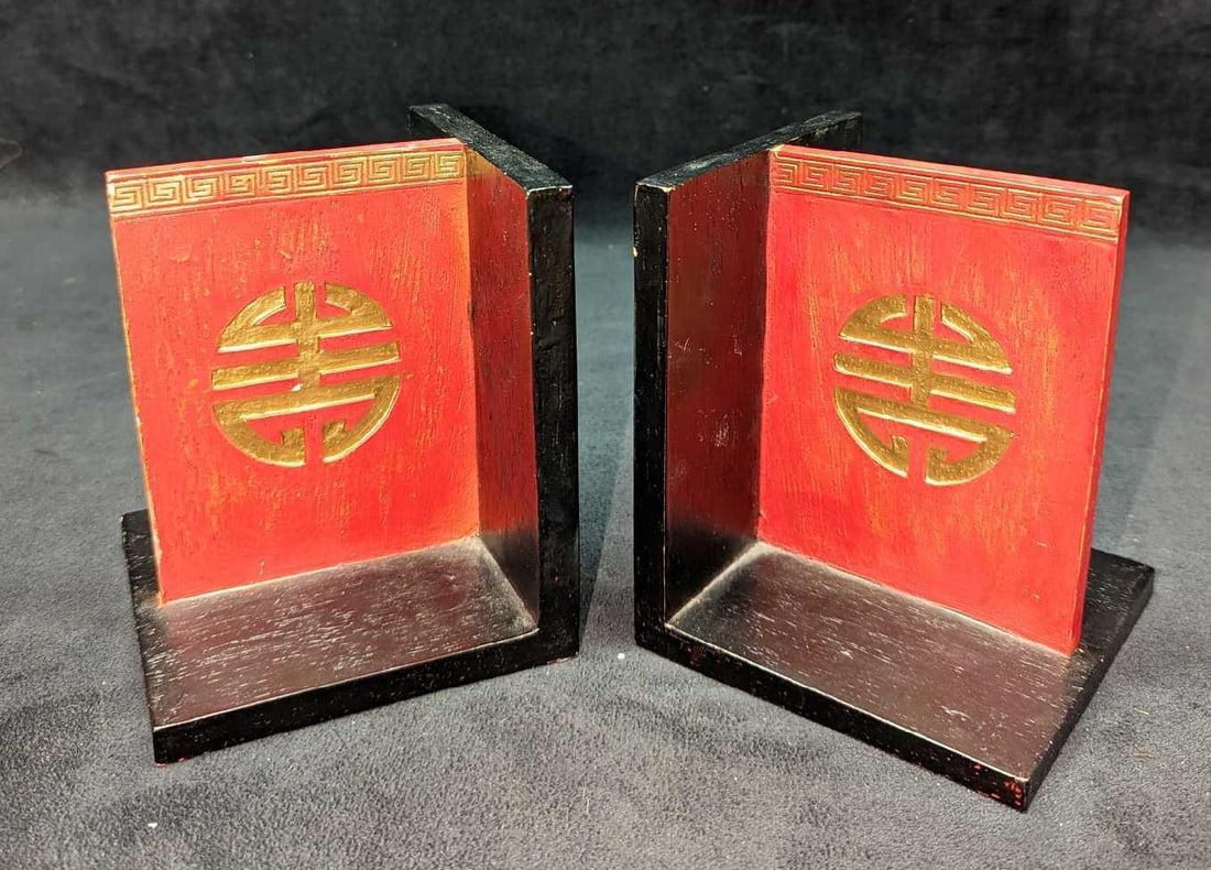 Pair Of Chinese Character Bookends: Pair Of Chinese Character Bookends. Hand-painted resin bookends are approximately 4 5/8" x 4 5/8" x 5 3/4" and weigh 3.15 lbs. The bookends have some chips and color loss. Please see the images as the