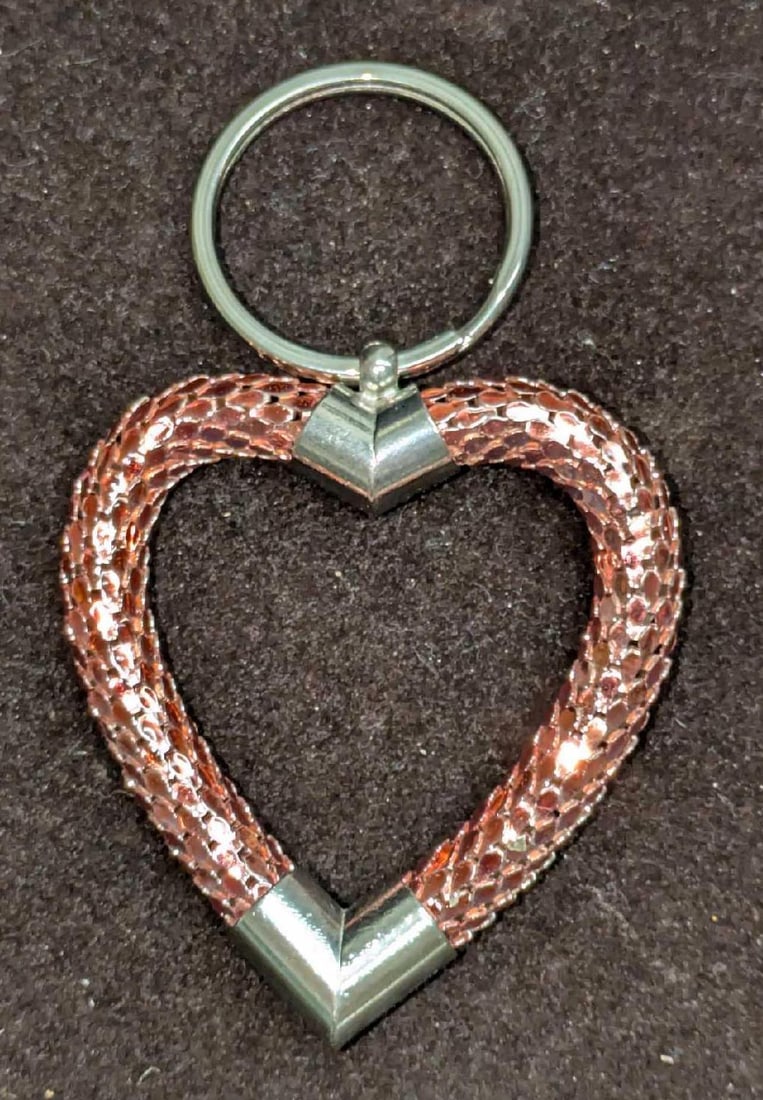 Whiting And Davis Pink Metal Mesh Heart Shaped Keychain: Whiting And Davis Pink Metal Mesh Heart Shaped Keychain. This is approx 2 1/4" x 1/4" x 4" and it weighs 0.05lb. 