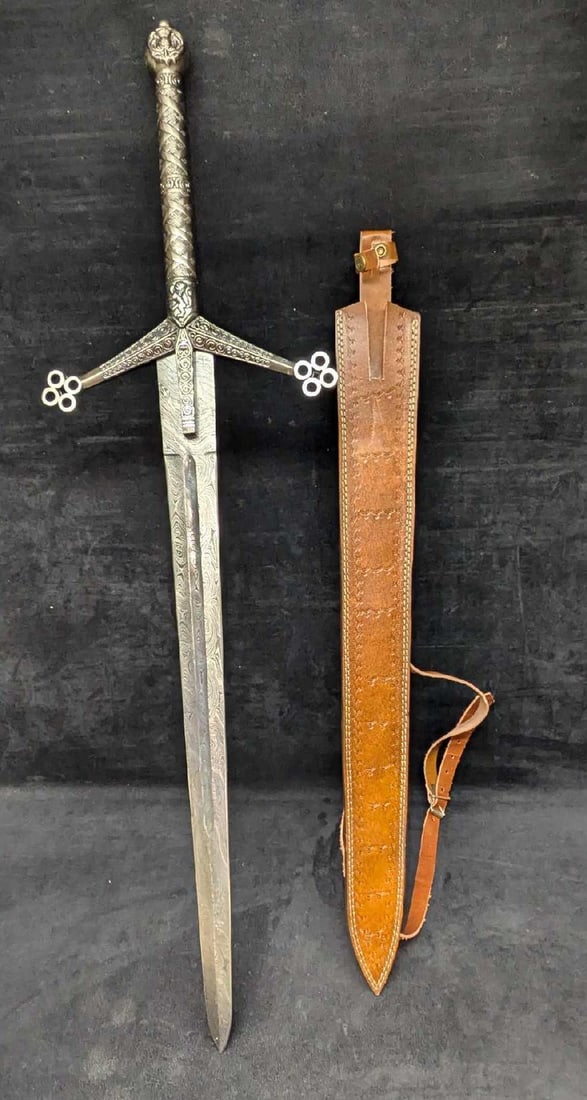 MHS Cutlery Fantasy Steel Sword With Leather Scabbard J: MHS Cutlery Fantasy Steel Sword With Leather Scabbard J. This is approx 10 7/8" x 2 x 38 1/8" and it weighs 4lbs. Has an Damascus printed design over the steel.Please see the images as they are part