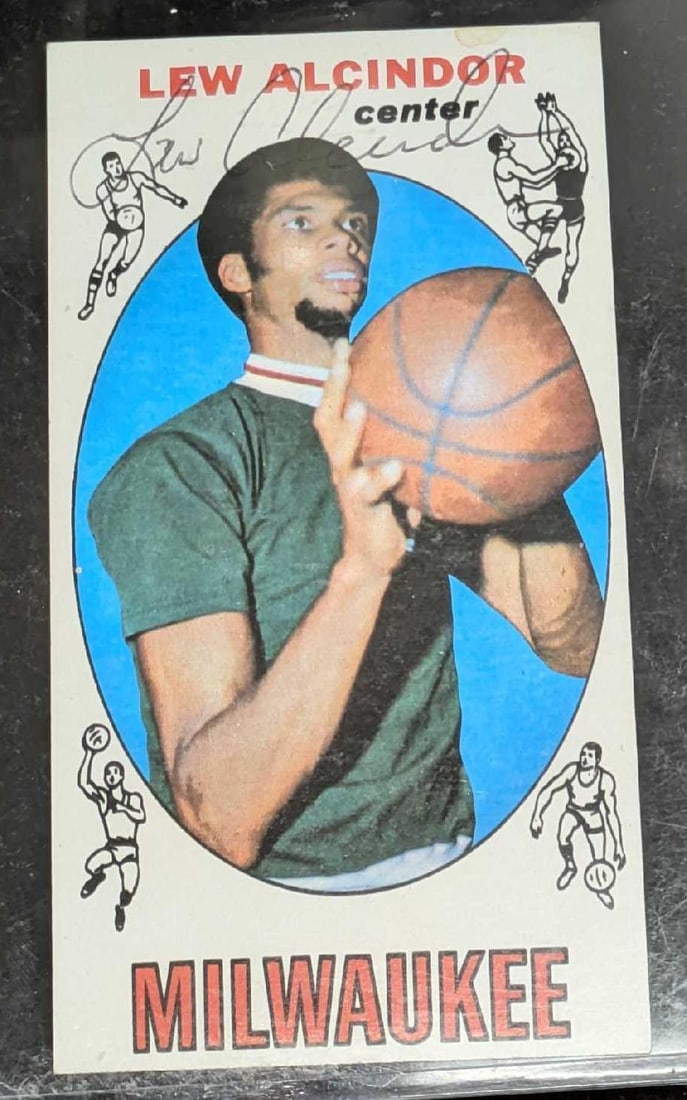 Lew Alcindor Autographed Rookie Card Kareem Abdul-Jabbar With COA: Lew Alcindor Autographed Rookie Card Kareem Abdul-Jabbar With COA. This is a rare Lew Alcindor autographed card signed as Lew Alcindor, a name Kareem used until he converted to Sunni Islam and started