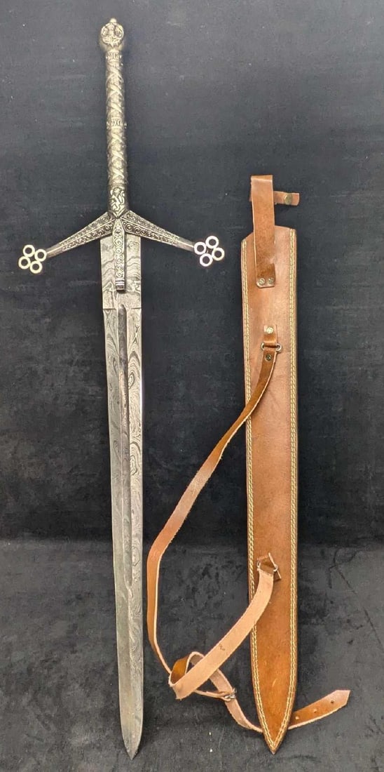 MHS Cutlery Fantasy Steel Sword With Leather Scabbard E: MHS Cutlery Fantasy Steel Sword With Leather Scabbard E. This is approx 10 7/8" x 2 x 38 1/8" and it weighs 4lbs. Has an Damascus printed design over the steel.Please see the images as they are part o