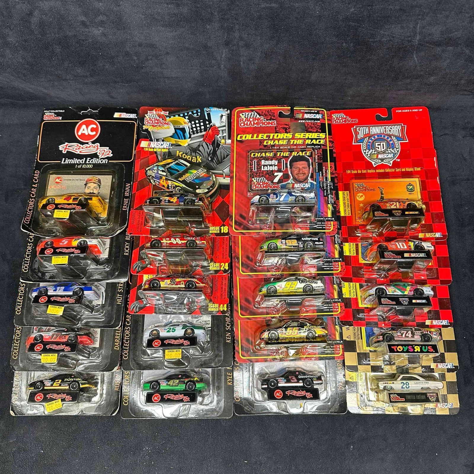 Racing Champions 1:64 Scale Die Cast Replica NASCAR Set of 20 Collectors Stock Cars: Racing Champions 1:64 Scale Die Cast Replica NASCAR Set of 20 Collectors Stock Cars. Various collection of NASCAR Racing Champions stock car collectibles featuring (20) 1:64 die cast cars. Several dif