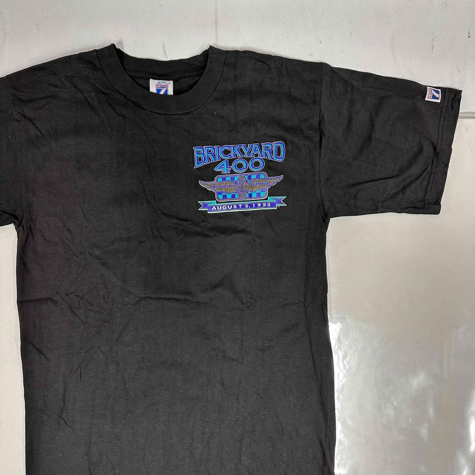 Vintage Logo Seven 7 Brickyard 400 Event Black T-Shirt Medium Shirt: Vintage Logo Seven 7 Brickyard 400 Event Black T-Shirt Medium Shirt. Size Medium. This item is in like new, previously displayed condition with light wear, and original tag is still intact. Please ref