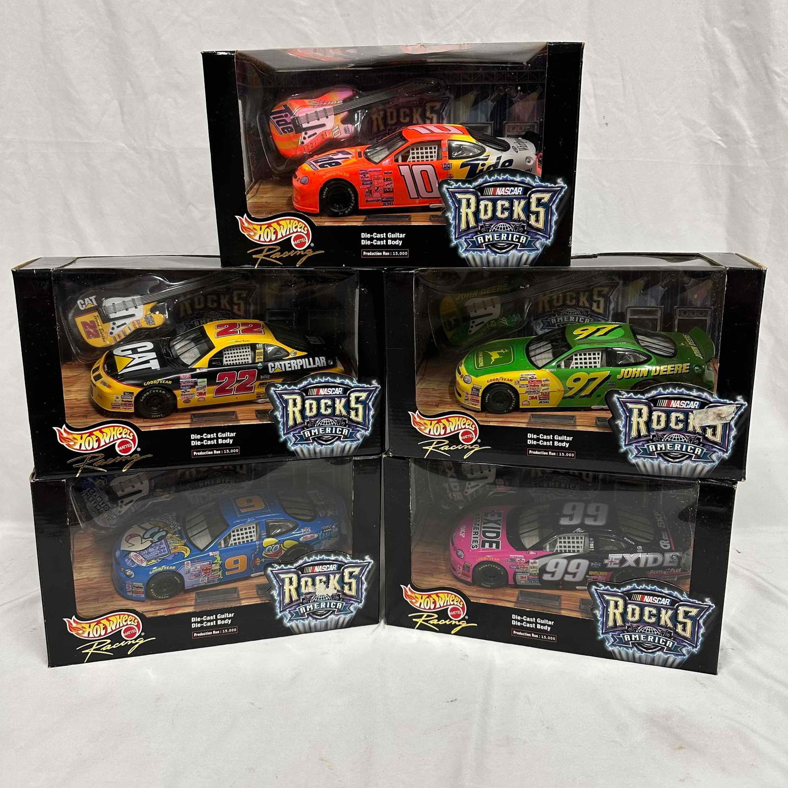 Hotwheels Racing Nascar Rocks America 1/24 Scale Set 1999 Five Cars: Hotwheels Racing Nascar Rocks America 1/24 Scale Set 1999 Five Cars. Set includes five NASCAR cars featuring several sponsor brands such as Tide, John Deere, Cartoon network, and more. These items are