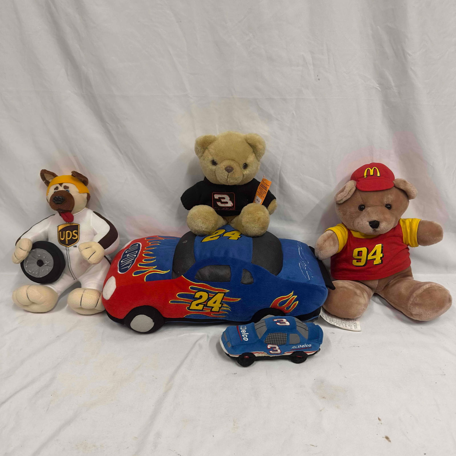 NASCAR Plush Collectible Collection Jeff Gordon Car Teddy Bear Bean Bag Plushie Souvenirs: NASCAR Plush Collectible Collection Jeff Gordon Car Teddy Bear Bean Bag Plushie Souvenirs. Various collection of NASCAR plush souvenirs. These items are in pre owned, previously displayed condition wi