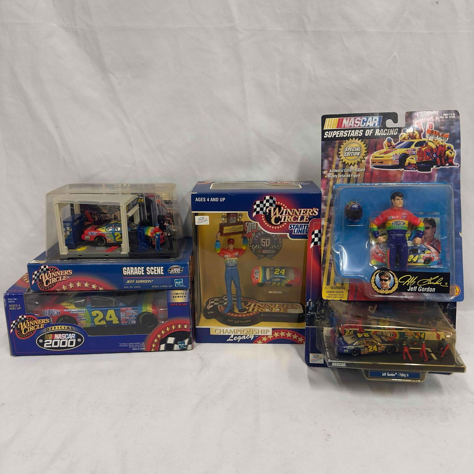 Winner's Circle Jeff Gordon NASCAR Limited Series Collectible Collection Set Five: Winner's Circle Jeff Gordon NASCAR Limited Series Collectible Collection Set Five. Each collectible is Sealed new featuring five die cast collectible cars with all collectibles featuring Jeff Gord