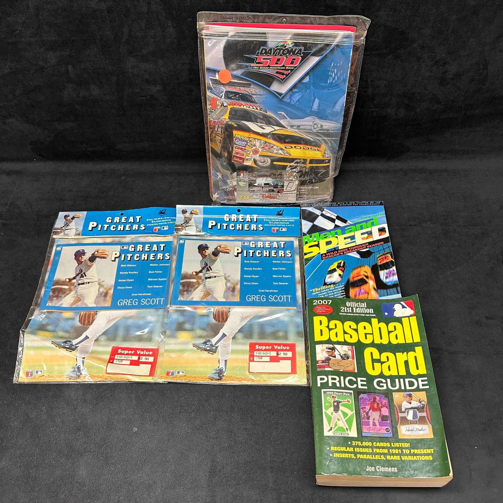 Sports Memorabilia Magazine and Books Collection NASCAR Baseball Set: Daytona magazine includes one die cast car. These items are in pre owned, previously displayed condition with light wear, and surface scratches. Please see all photos for full details. Books: