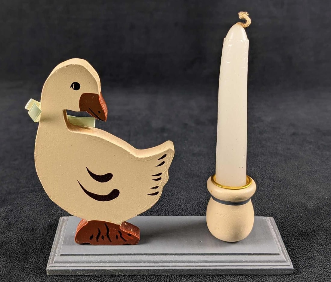 Vintage Wooden Country Duck Candle Holder: "A collector's delight!" "Hand Finished Wooden Duck And Base In The Warmth Of Candlelight. Perfect anywhere, and a great gift, too". Comes with a candle. In a good, vintage unused condition with light