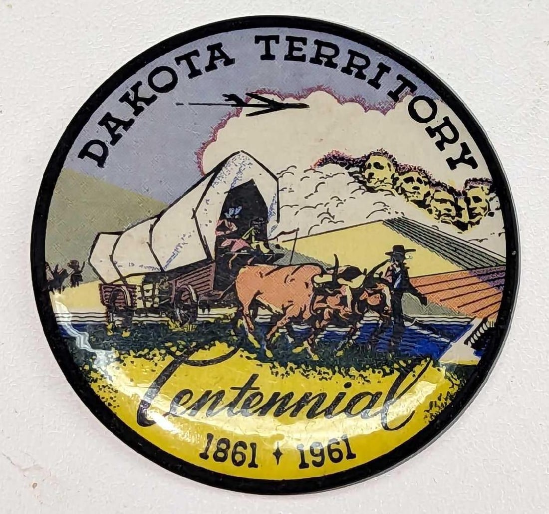 Vintage Dakota Territory Centennial Button: Vintage Dakota Territory Centennial Button. 1861-1961. The button is approx 2 1/8" x 2 1/8" and it weighs 0.02lb. The button has some wear on the face and back.