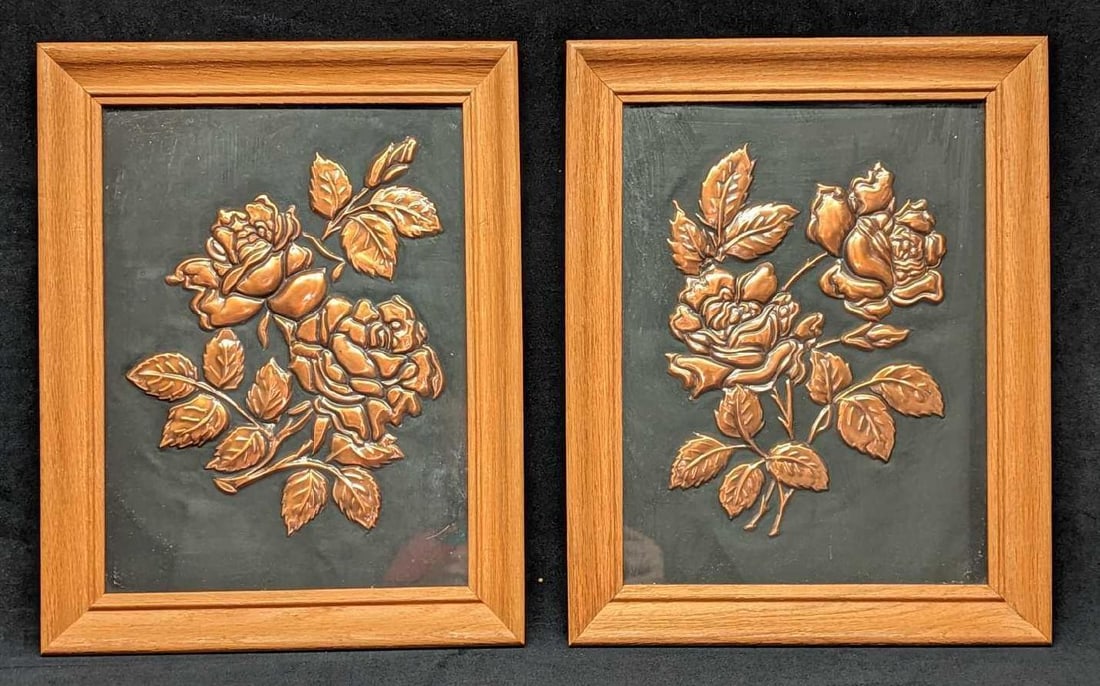 2 Framed Copper Embossed Floral Bouquets: Copper embossed floral bouquets in wooden frame with wire setting. It is a matching set of flowers. Set in a brown frame ready to hang. In a good condition with a small scratch on one of the flower in