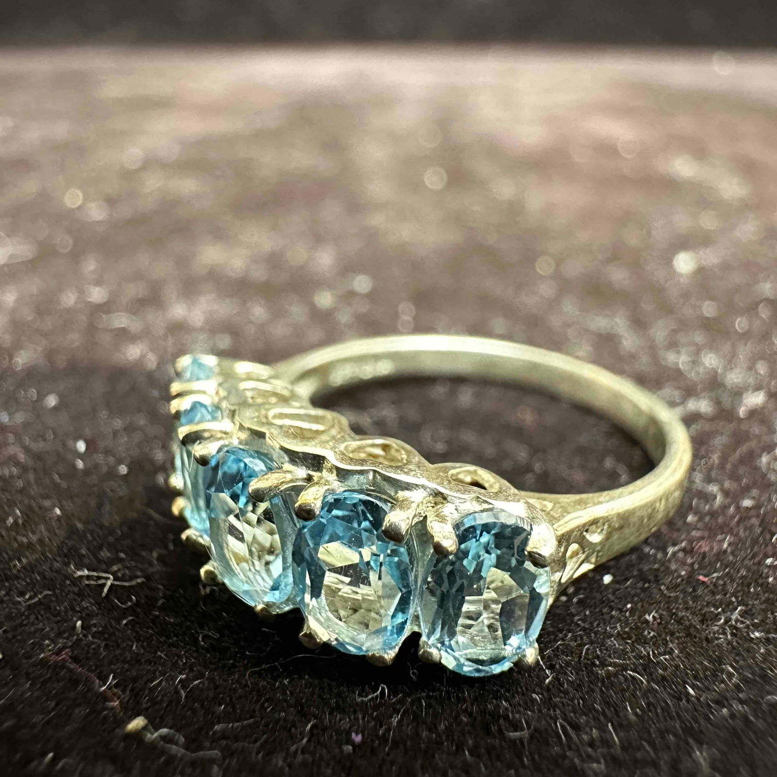 Blue Topaz Gemstone Heart Gallery Accent Sterling Silver Ring: This item is in good pre-owned, previously used/displayed condition with noticeable light wear, and surface scratches. Please reference all photos for full details. This piece of jewelry has been test