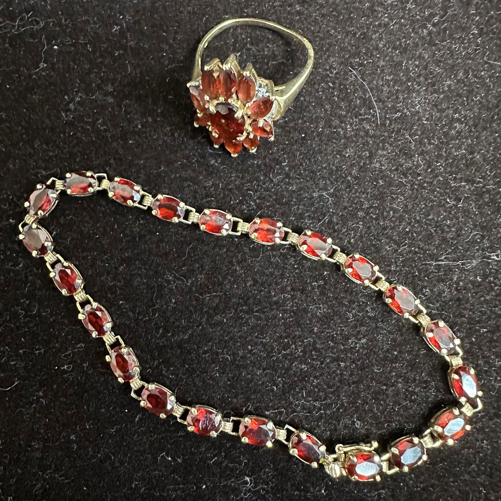 Encrusted Red Garnet Gemstone 10K Gold Bracelet and Ring: This item is in good pre-owned, previously used/displayed condition with noticeable light wear and surface scratches. Please reference all photos for full details. This piece of jewelry has been teste