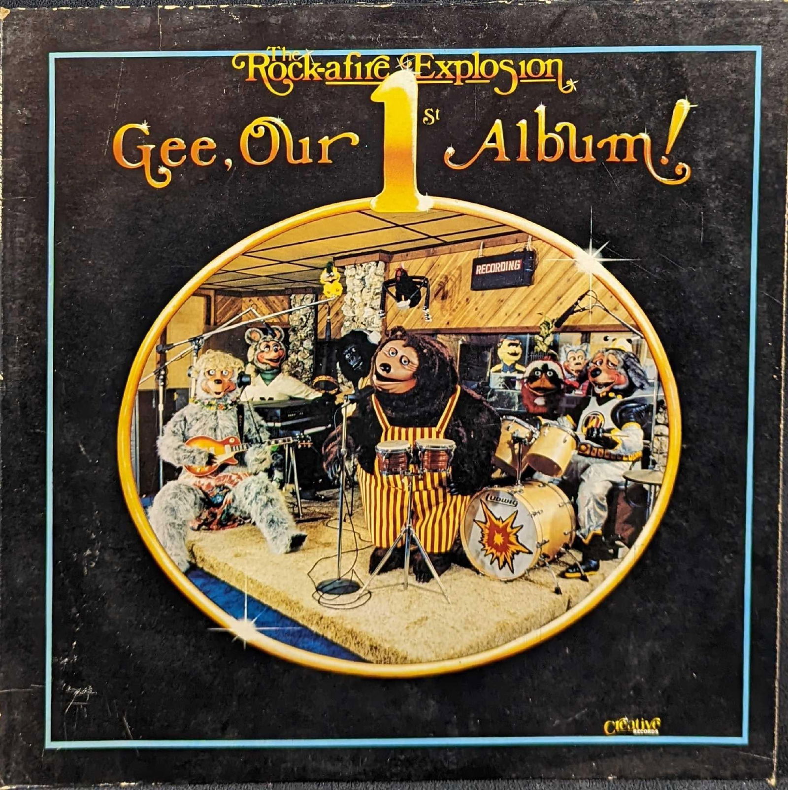 Rare Rock-Afire Explosion Gee Our 1st Album: Rock-Afire Explosion "Gee Our 1st Album". This was released by Creative Records in 1982. Is approx 12 3/8" x 12 1/2" and it weighs 0.53lb. The jacket has some shelf-wear and the record has some signs