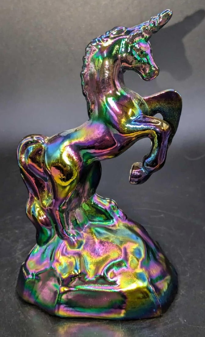 Fenton Iridescent Glass Unicorn Figurine: Fenton Iridescent Glass Unicorn Figurine. This is approx 3 1/8" x 2 1/4" x 5 1/4" and it weighs 0.70lb. The glass figurine has no chips or cracks.