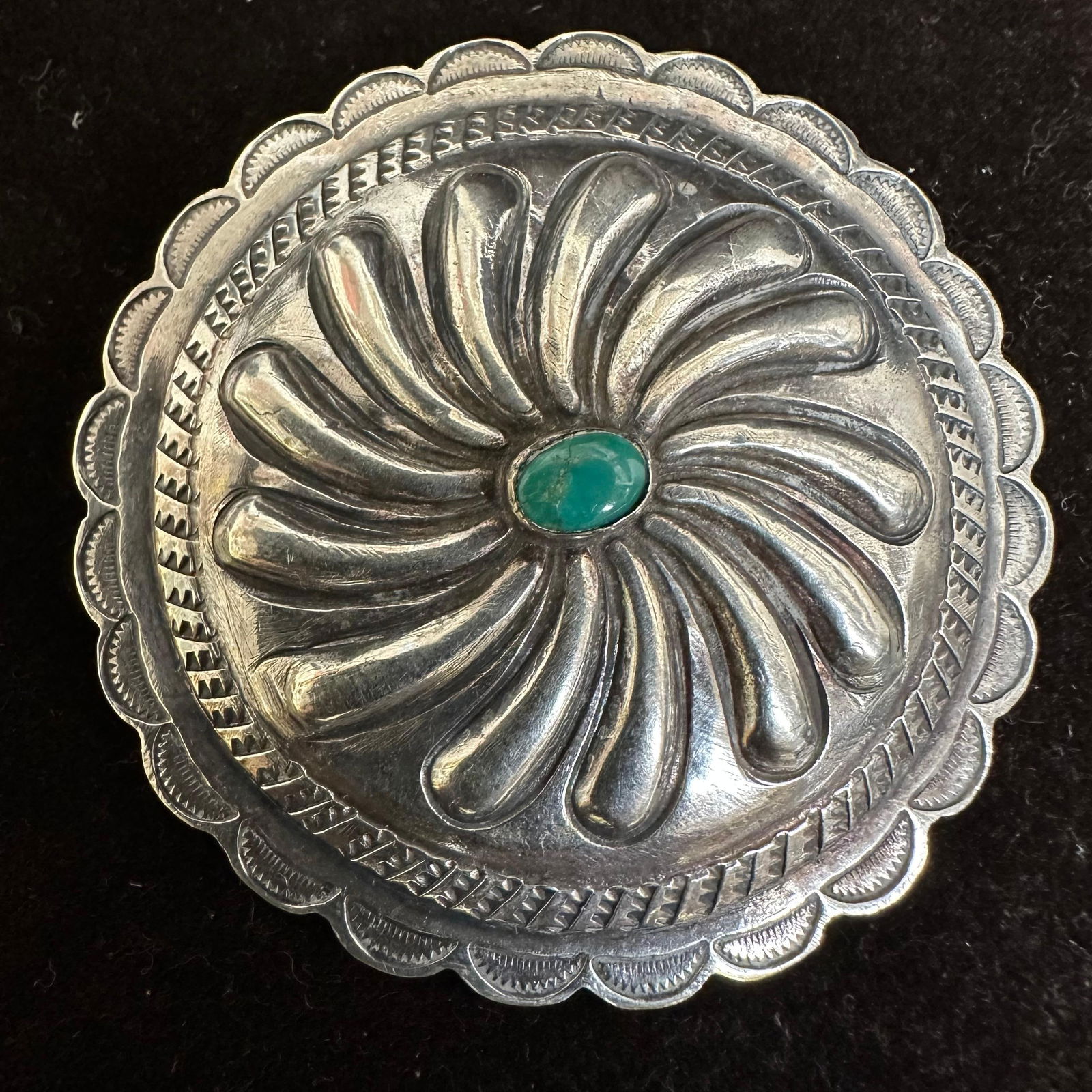 Green Turquoise Center Concho Silver Brooch: This item is in good pre-owned, previously used/displayed condition with noticeable light wear and surface scratches. Please reference all photos for full details. This piece of jewelry has been teste