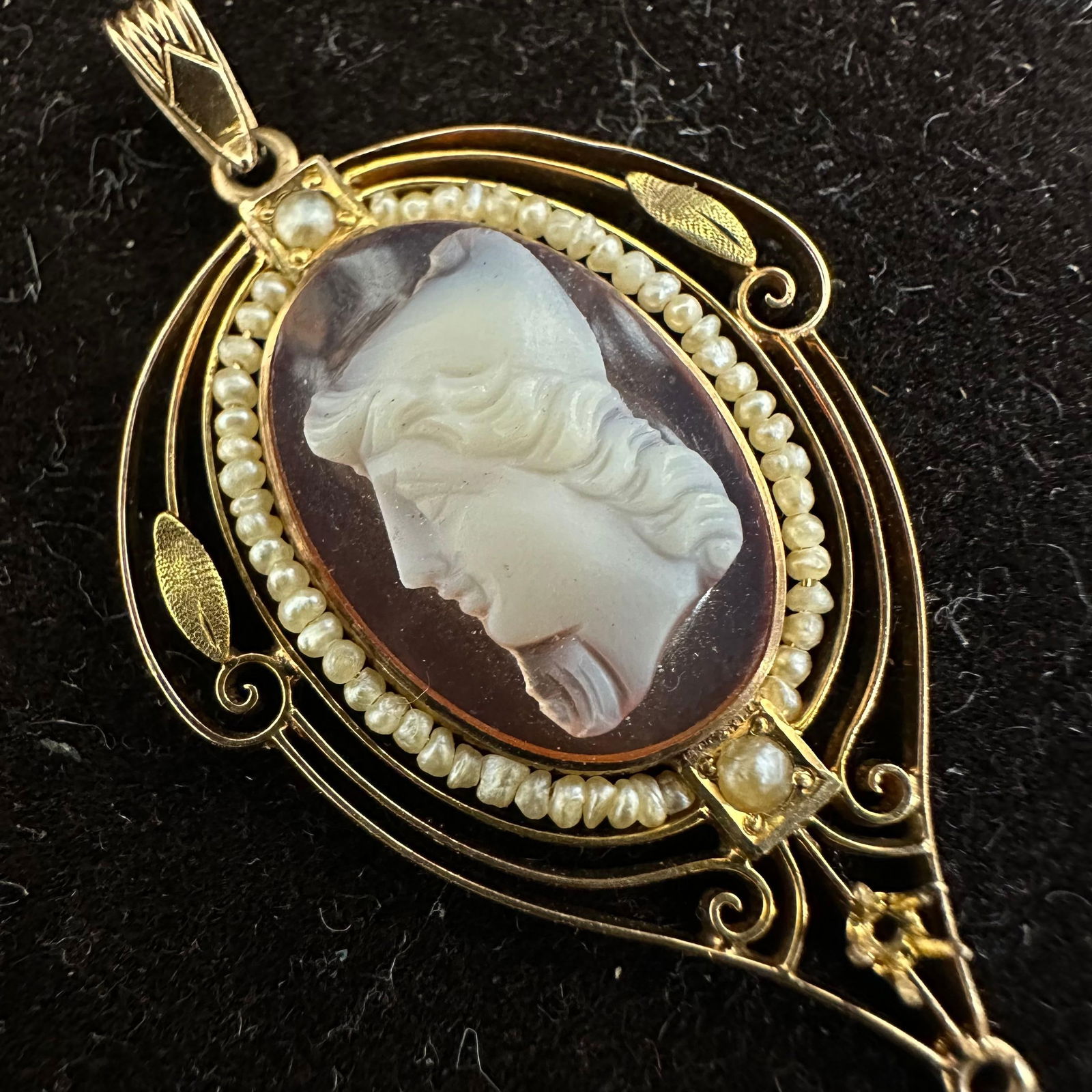 Shell Cameo 10K Gold Pendant: This item is in good pre-owned, previously used/displayed condition with noticeable light wear and surface scratches. Please reference all photos for full details. This piece of jewelry has been teste