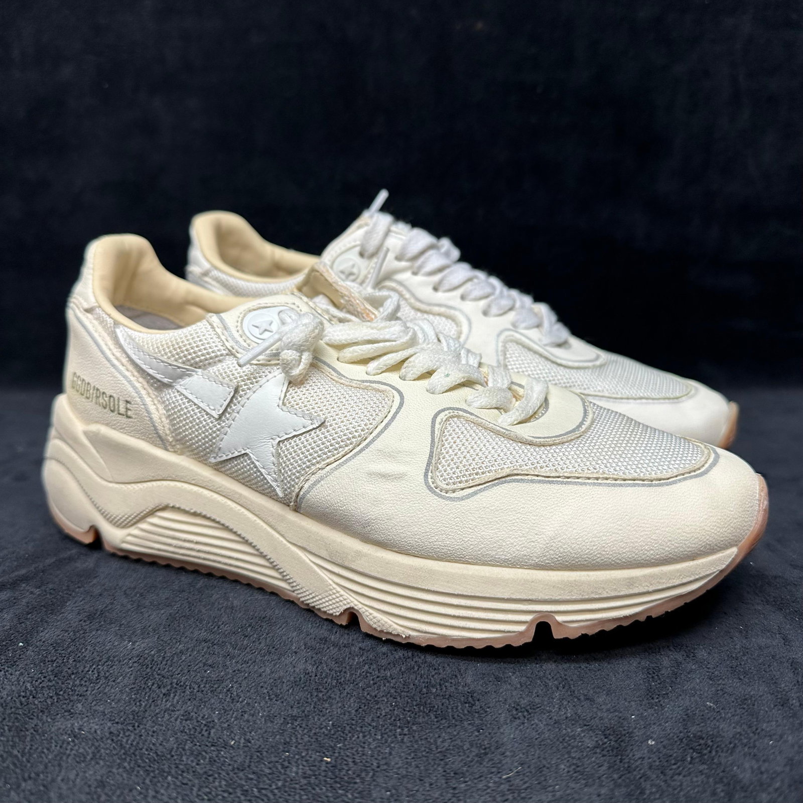 Golden Goose Running Sole Sneakers Cream White Leather and Mesh GGDB: Pair of Golden Goose Deluxe Brand GGDB Running Sole sneakers in a cream/white colorway. Features leather and mesh uppers with signature star detail, lace-up closure, padded collar, and chunky running-