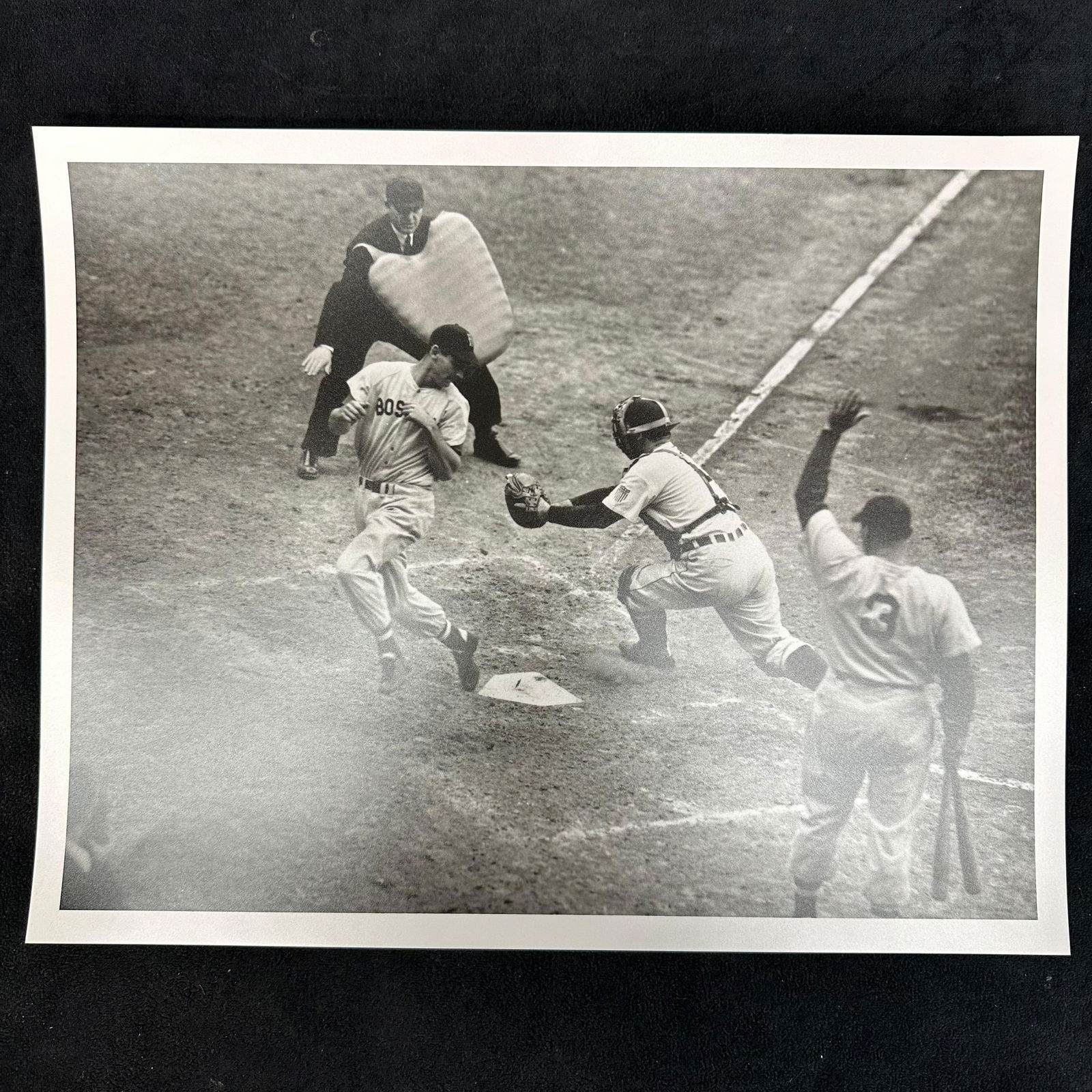 Silver Gelatin Print Baseball Action at Home Plate Boston Red Sox Runner Tagged Black and White: Black and white analog photographic print capturing an iconic baseball moment at home plate. A Boston Red Sox runner attempts to score as the opposing catcher makes the tag, while the umpire and teamm